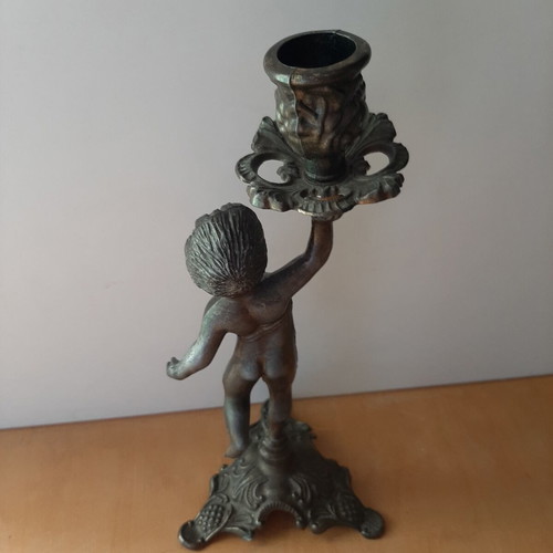 Vintage metal candlestick with boy figure like new