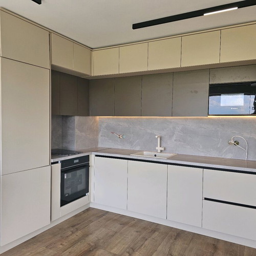 L-shaped kitchen new MDF and chipboard cabinets with Latte color