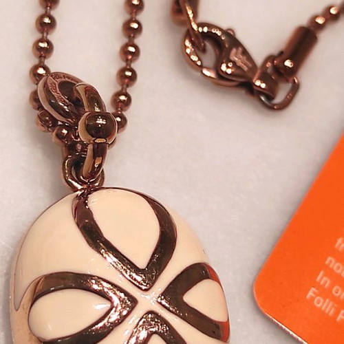 Folli Follie necklace used pink gold plated oval cross with floral design