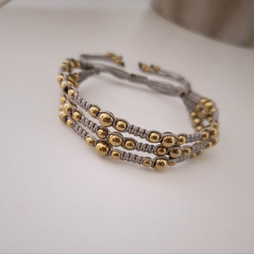Triple macrame bracelet with gold hematite beads