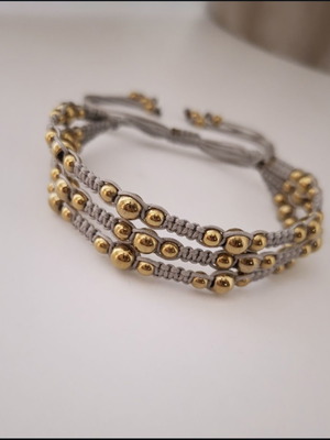 Triple macrame bracelet with gold hematite beads
