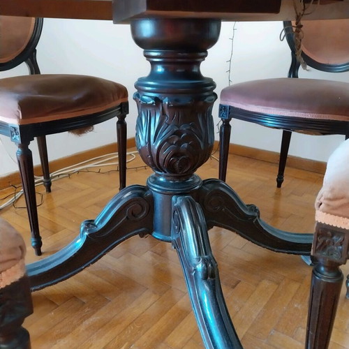 Wood-carved round table with 4 chairs like new