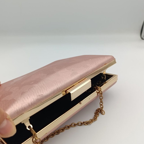 Baby Pink Clutch Bag used with embossed print and gold chain strap