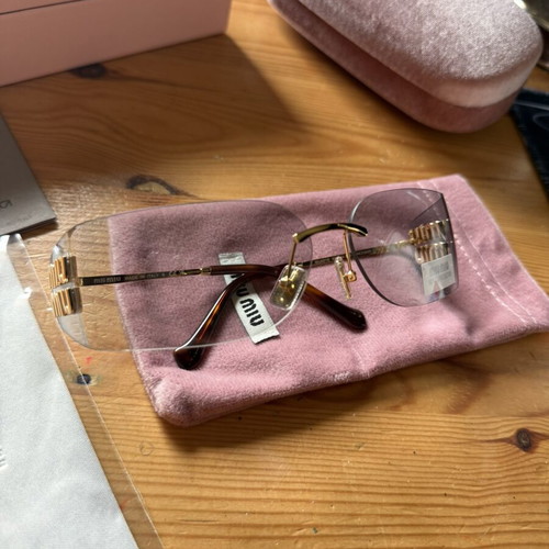 Miu Miu sunglasses, grey and gold