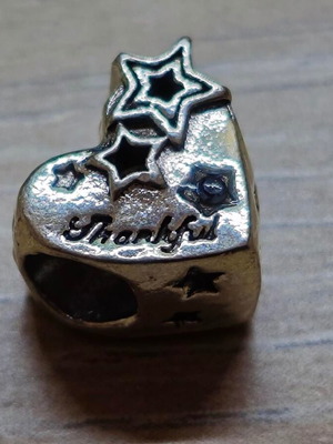 Silver charm heart with stars and blue crystal like new