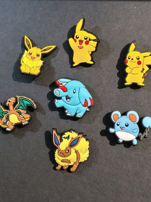 Pokémon charms set like new, multicolored and yellow