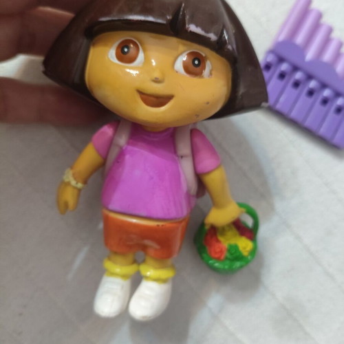 Dora the Explorer figures used, including backpack and magic flute