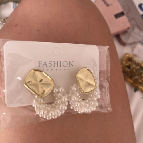 Earrings, unused