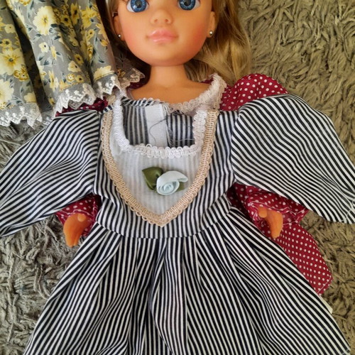 Nancy Famosa doll 2010 with 3 vintage dresses