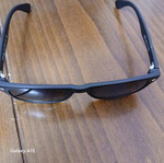 Swing sunglasses new with black plastic frame and men's lenses