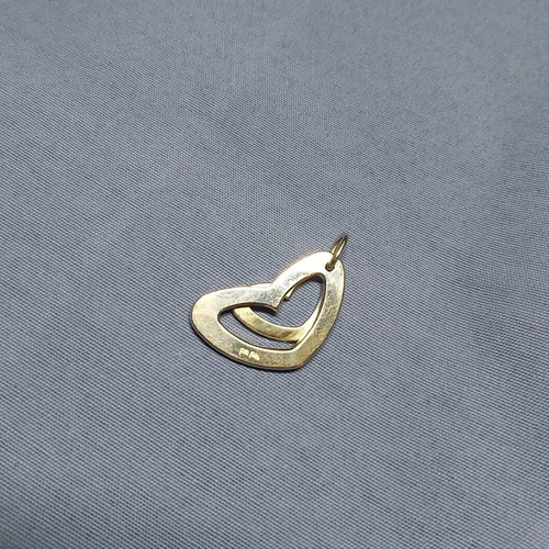 Jewelry used, metal heart Folli Follie, not silver