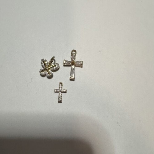 Cross pendants, gold color