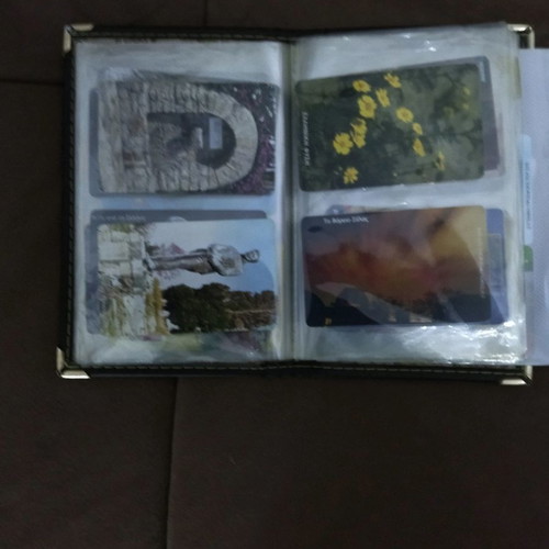 Collectible phone cards used with album