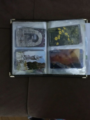 Collectible phone cards used with album