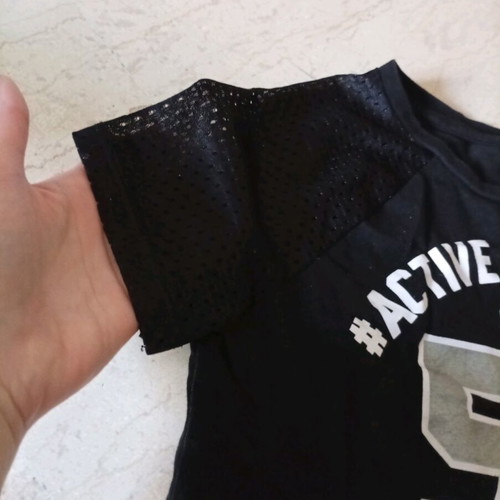 Girls' short-sleeve t-shirt size 134 like new, black