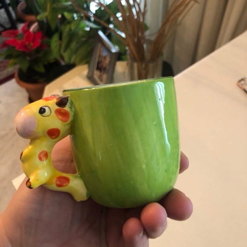 Mug like new with giraffe design