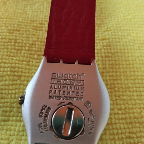Swatch collectible watch with stones and leather strap, red and pink