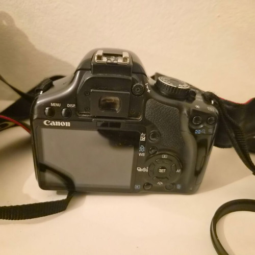 Canon EOS 450D camera used with 17-85mm zoom lens and accessories