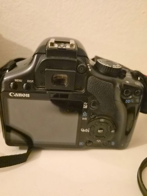 Canon EOS 450D camera used with 17-85mm zoom lens and accessories