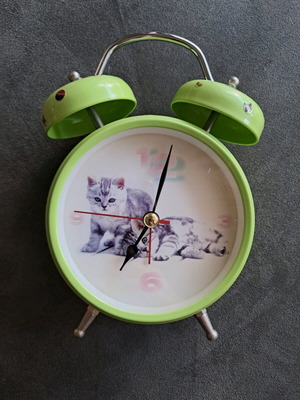 Table clock used with cat alarm and cat design