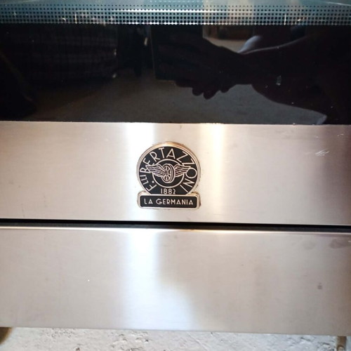 LaGermania gas stove like new with cast iron grates and electric function