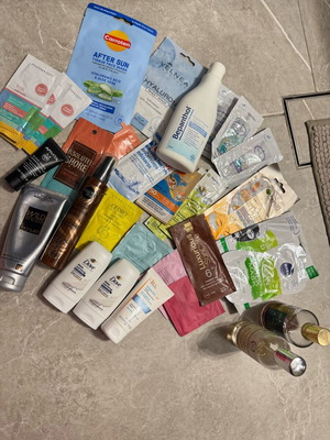 Set of various used products with colognes and face and body creams