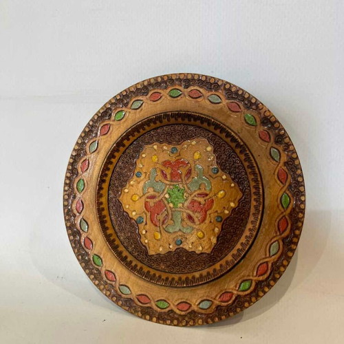 Vintage handmade wooden wall plate with pyrography and folk motif, 12cm