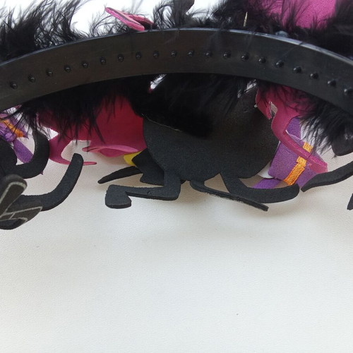 Children's Halloween headband used with spiders and feathers