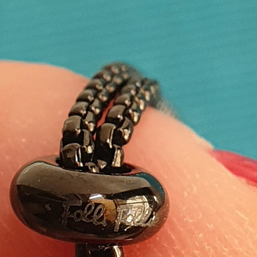 Folli Follie bracelet like new, black with blue crystals, adjustable