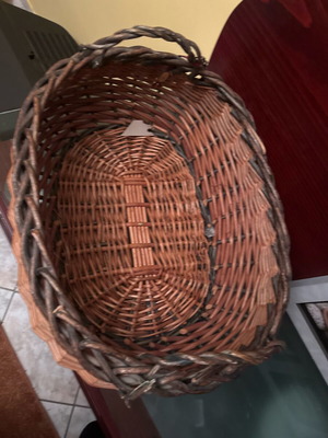 Wicker storage basket used, rustic and practical