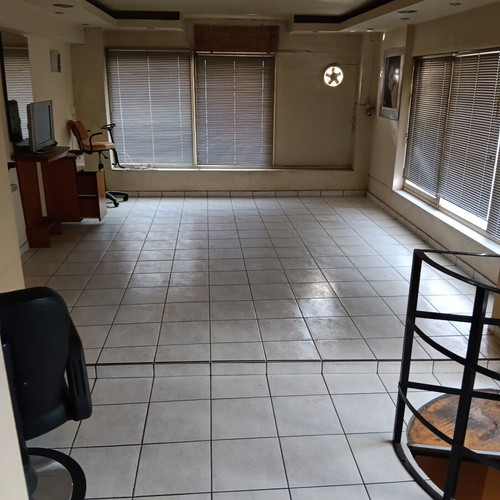 Multipurpose building with apartment and commercial space, Galatsi