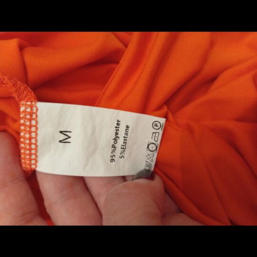 Karavan set with skirt and plain bodysuit, colorful orange