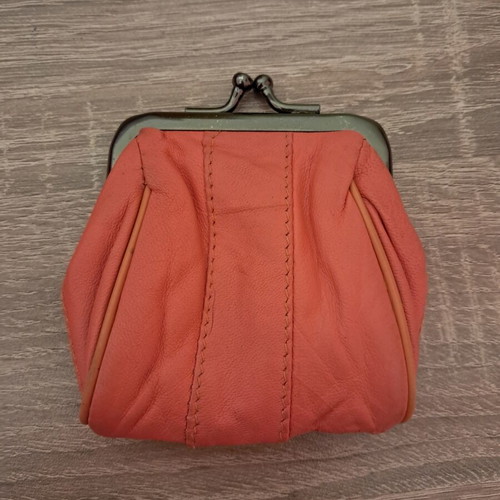 Wallet used, coral color, for coins or other use