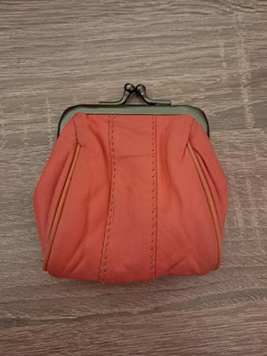 Wallet used, coral color, for coins or other use