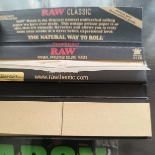Classic Raw Black rolling papers used, about 16 sheets