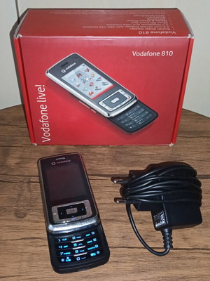 Vodafone 810 slider phone used with charger and original box