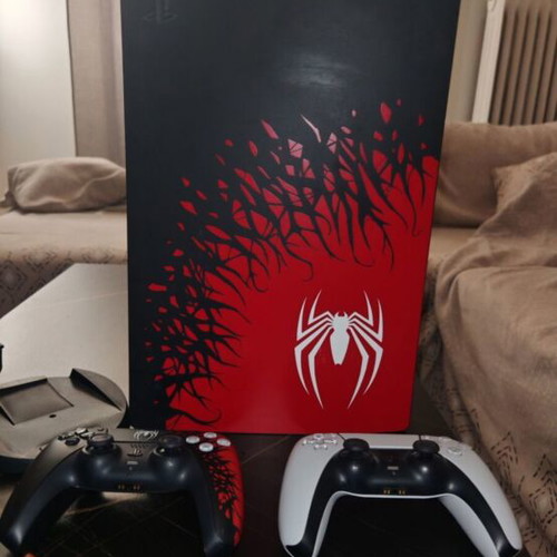 PS5 Spider-Man Edition console with Spider-Man controller