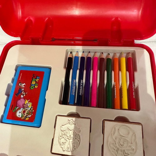 Mario case used with colored pencils, stamps and drawing pad