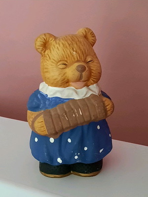 Vintage children's clay piggy bank bear with accordion like new