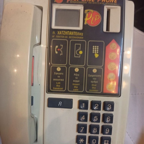 Coin-operated phone like new