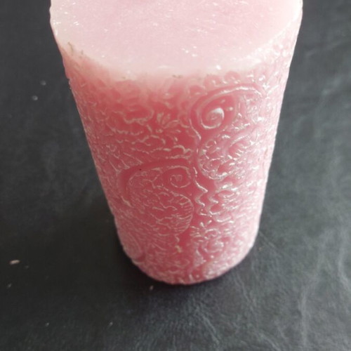 Pink candle with designs new, height 13cm, diameter 6cm