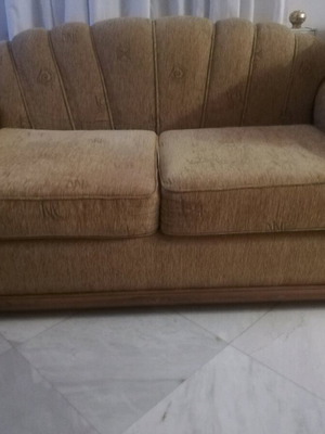 Two-seater sofa with velvet upholstery like new