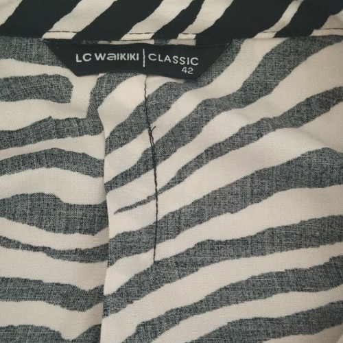Dress tunic like new, black and white, sizes M to XL