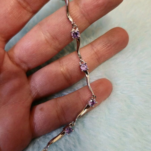 Fairy bracelet like new with purple stones and silver chain