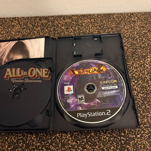 Devil May Cry 2 PS2 game, complete with manual