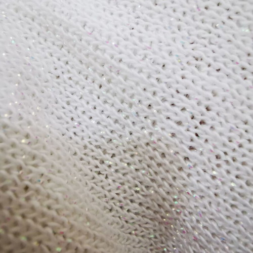 White Paranoia knitted top like new with one shoulder and glitter