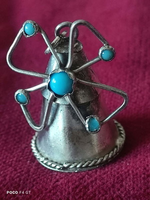 Silver pendant used, windmill shape with turquoise stones