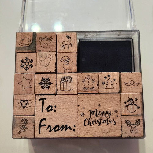 Craft set with wooden Christmas stamps used