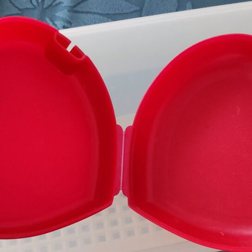 Tupperware heart-shaped food container like new