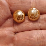 Button earrings in bright honey glossy color like new